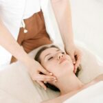 A soothing facial massage therapy session promoting relaxation and wellness.
